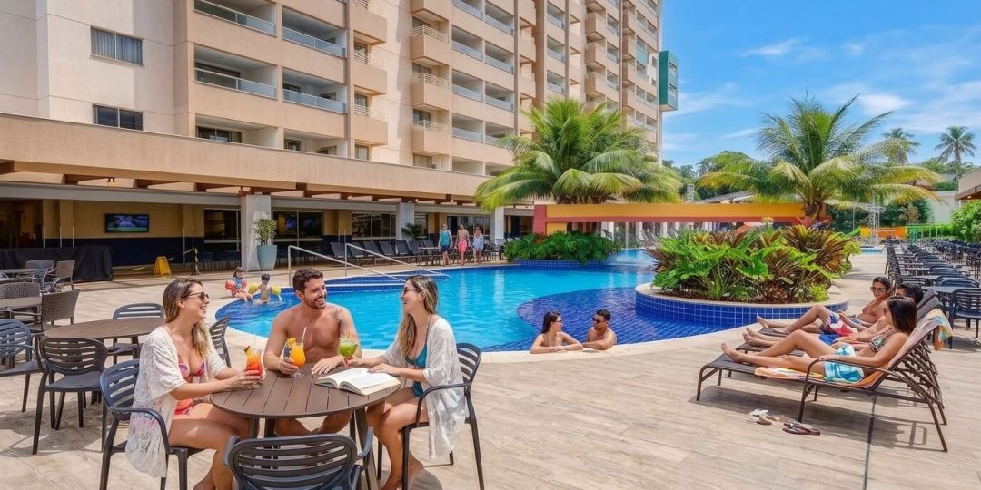 People_relaxing_in_resort_pool_202609091437